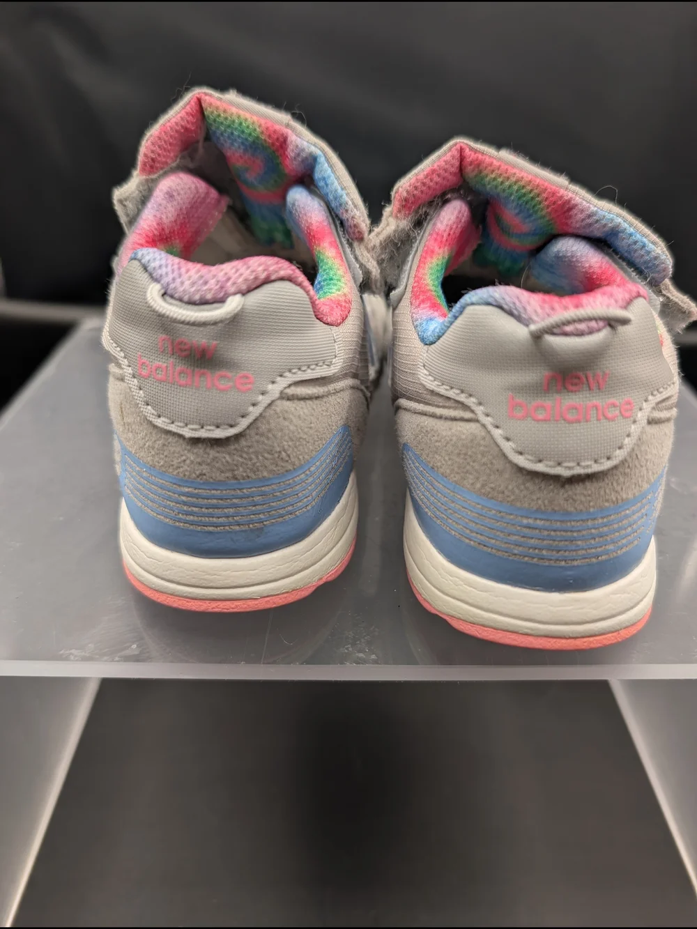New Balance Kids Gray Sneakers with Blue Logos and Pink Trim